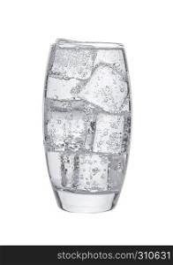 Glass of cold sparkling water with ice cubes on white background