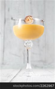 Glass of Eggs-cellent Cocktail garnished with chocolate candy