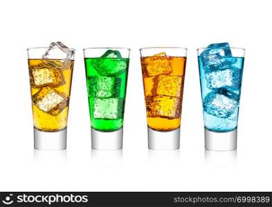 Glass of energy carbonated soda drink with ice on white background.Blue, orange and green color