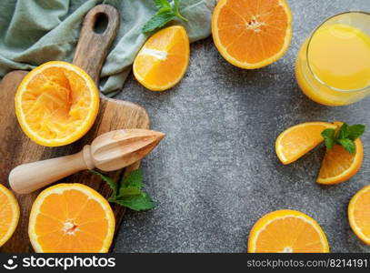 Glass of fresh orange juice with fresh fruits