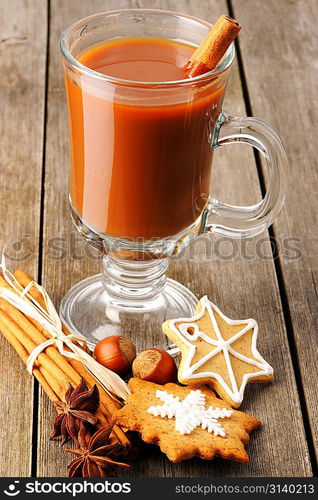 Glass of hot chocolate on wooden table