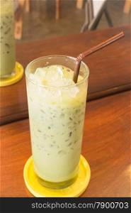 Glass of iced green tea latte, stock photo