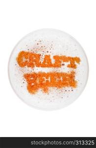 Glass of lager ale beer top with craft beer letters shape on white background top view