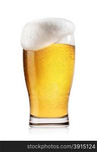 Glass of light beer with white foam isolated on white background. Glass of light beer with white foam