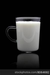 Glass of milk isolated on reflect floor and black background