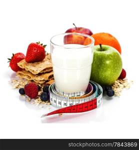 Glass of milk or kefir, fruits, crispbreads, berries and measuring tape isolated on white