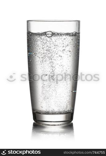 glass of mineral water on white background. glass of mineral water