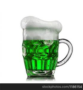 Glass of natural green alcoholic beer drink with extra foam on a white background, copy space. Happy St.Patrick &rsquo;s Day concept.. Natural organic green beer in the different glasses.