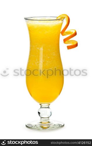 Glass of orange drink in hurricane cocktail glass