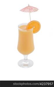 Glass of orange juice with slice of orange and drink umbrella