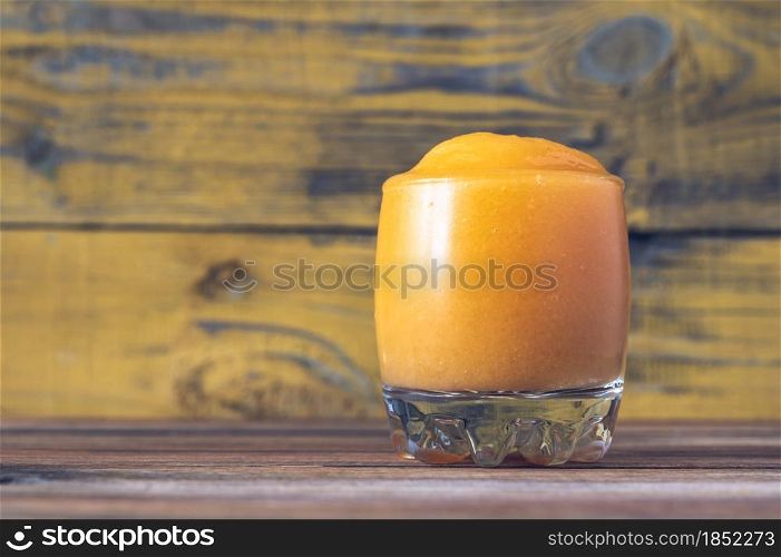 Glass of Papaya Caliente - fruity rum cocktail