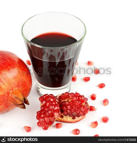 Glass of pomegranate juice with fruit isolated on white. Free space for text.