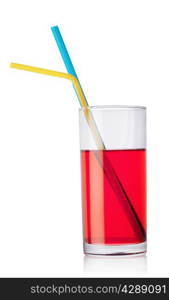 Glass of red drink and tubes isolated on white background