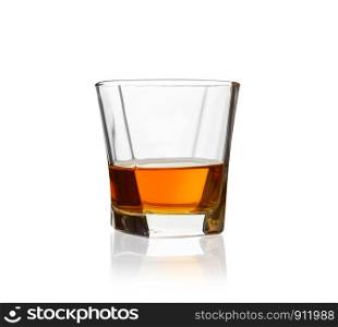 Glass of scotch whiskey isolated on a white background