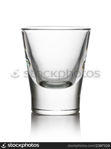 Glass of shot drink isolated on a white background. Glass on a white background