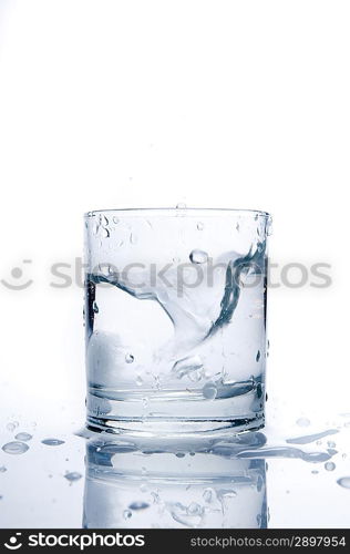 Glass of splashing water