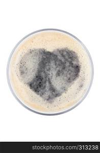 Glass of stout beer top with heart shape on white background top view