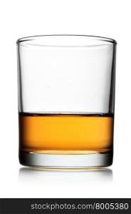 Glass of whiskey isolated over white background