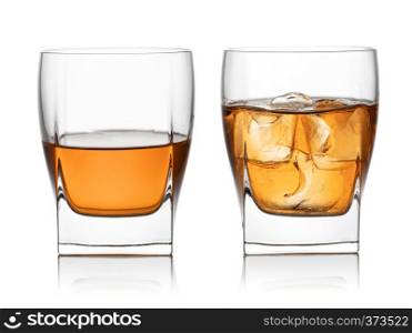 Glass of whisky and ice isolated white background. Glass of whisky