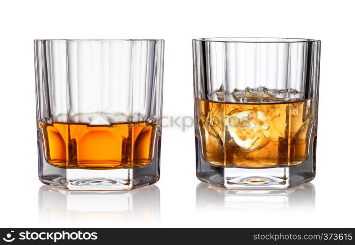 Glass of whisky and ice isolated white background. Glass of whisky