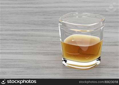 Glass of whisky, brandy or other alcoholic drink on wooden table