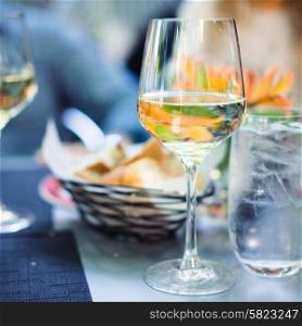 Glass of white wine outdoors