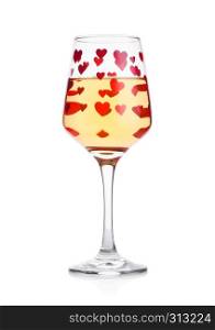 Glass of whitewine with red and pink heart shape for valentine's day on white background