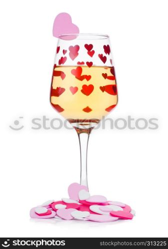 Glass of whitewine with red and pink heart shape for valentine's day on white background