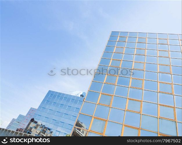 Glass reflection colored. Reflection in glass office building