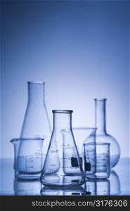 Glass science containers with blue tint.
