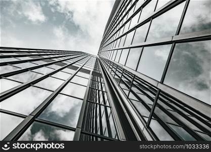 Glass surface of skyscrapers view in district of business centers. black and white