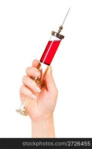 Glass syringe in a hand on the white