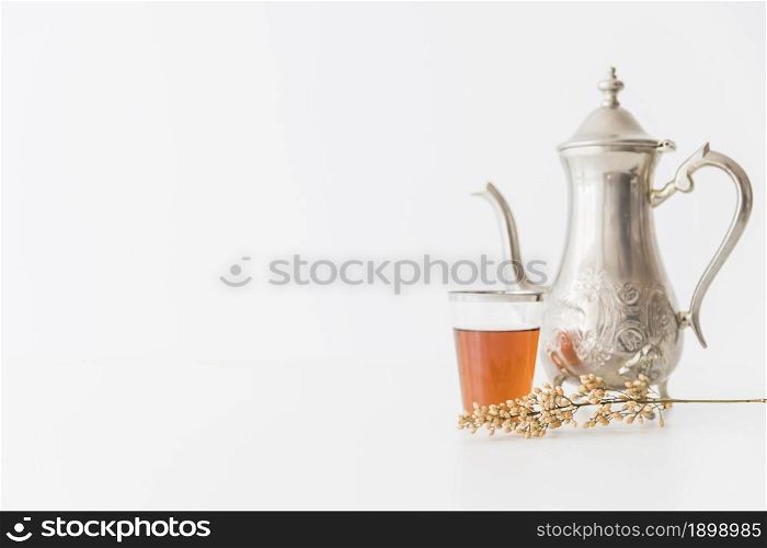 glass tea with teapot branch. Resolution and high quality beautiful photo. glass tea with teapot branch. High quality beautiful photo concept
