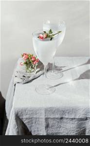 glass water with flower petals 3