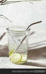 glass water with lemon slices table