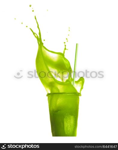 Glass with drinking straw green splash summer beverage: smoothie or juice, isolated on white background, front view