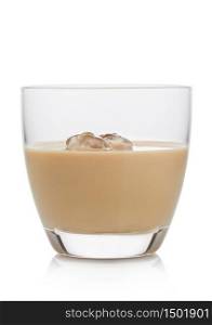 Glass with ice cubes of whiskey and cream based liqueur on white background.