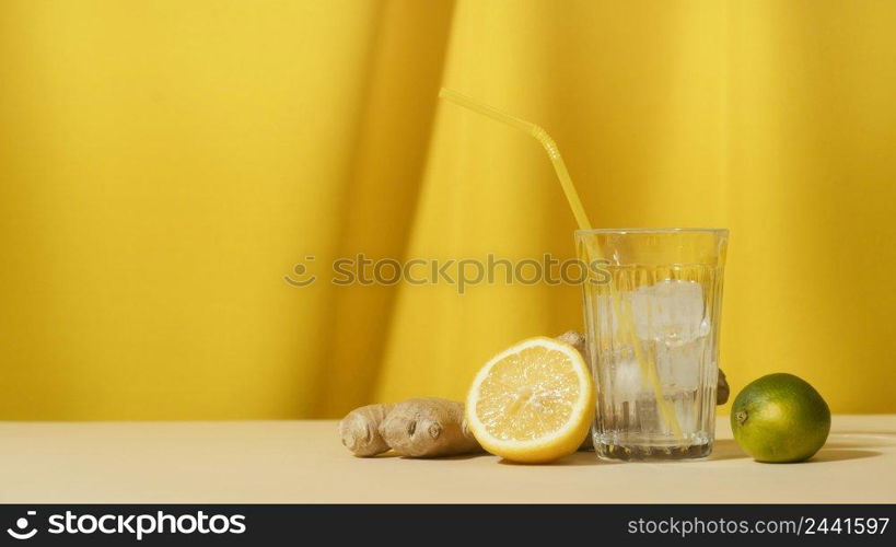 glass with ice straw arrangement