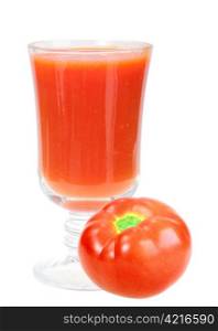 Glass with red tomato juice and full tomato. Isolated on white background. Close-up. Studio photography.