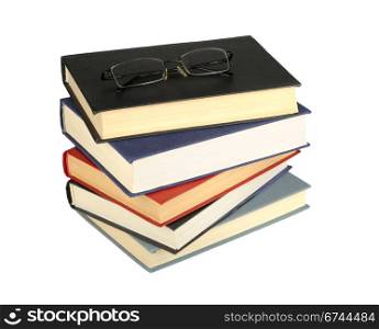 glasses and books isolated on white background