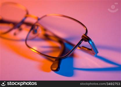 glasses closeup with multicolored lights