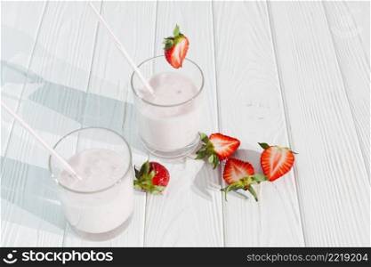 glasses milkshake with strawberries