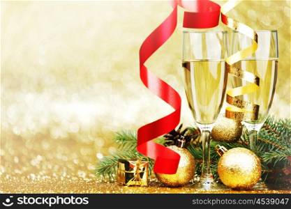 Glasses of champagne and decoration with natural fir branch