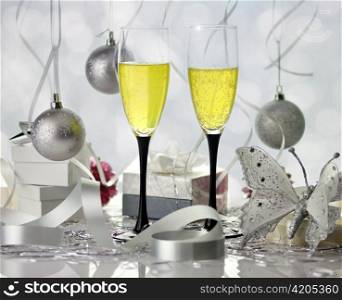 Glasses of champagne with christmas decorations