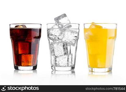 Glasses of cola and orange soda drink and lemonade sparkling water on white background with ice cubes