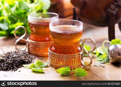 glasses of hot tea with mint