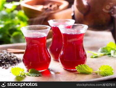 glasses of hot tea with mint