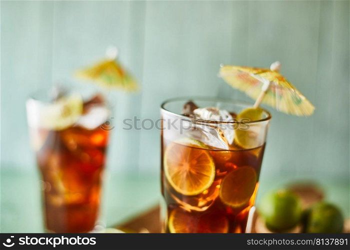 Glasses of iced tea with lemon slices. . Glasses of iced tea. 