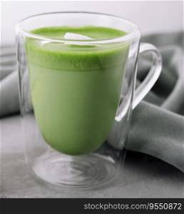 Glasses of matcha latte with white chocolate