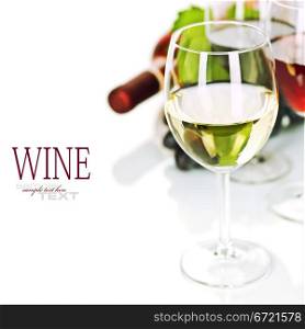 Glasses of white, red and rose wine and grapes over white (easy removable sample text)